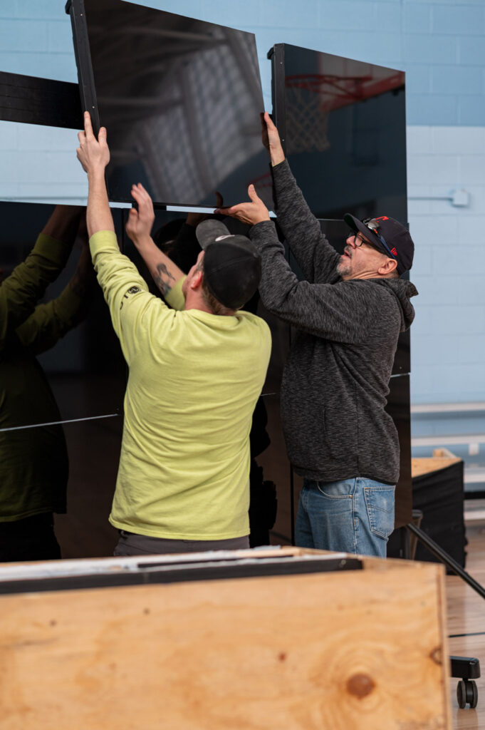 Setting up a Video Wall for Smuckers event for the Boys and Girls Club of Cleveland