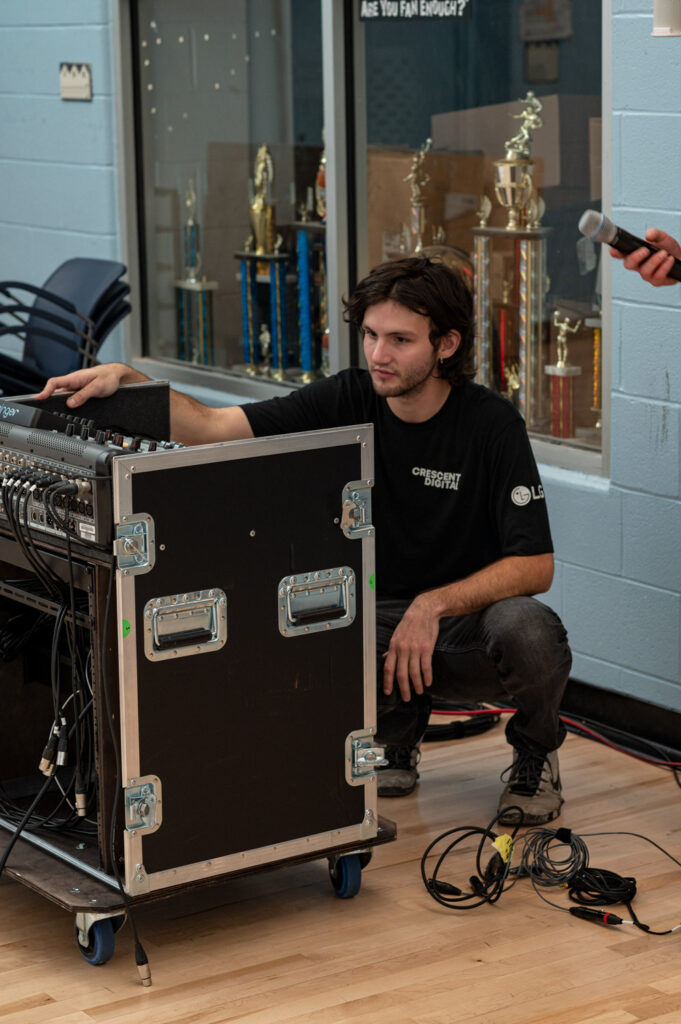 Setting up the Audio Amp at the JM Smucker event for Boys and Girls club of Cleveland