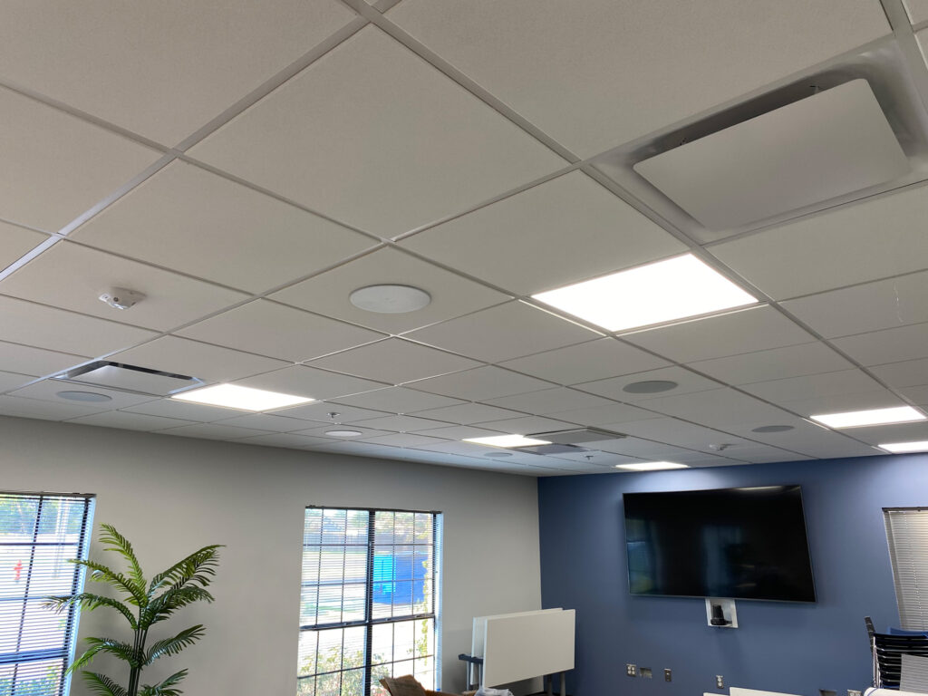 CVN Conference room with Shure Microphones and LG Displays installed by Crescent Digital