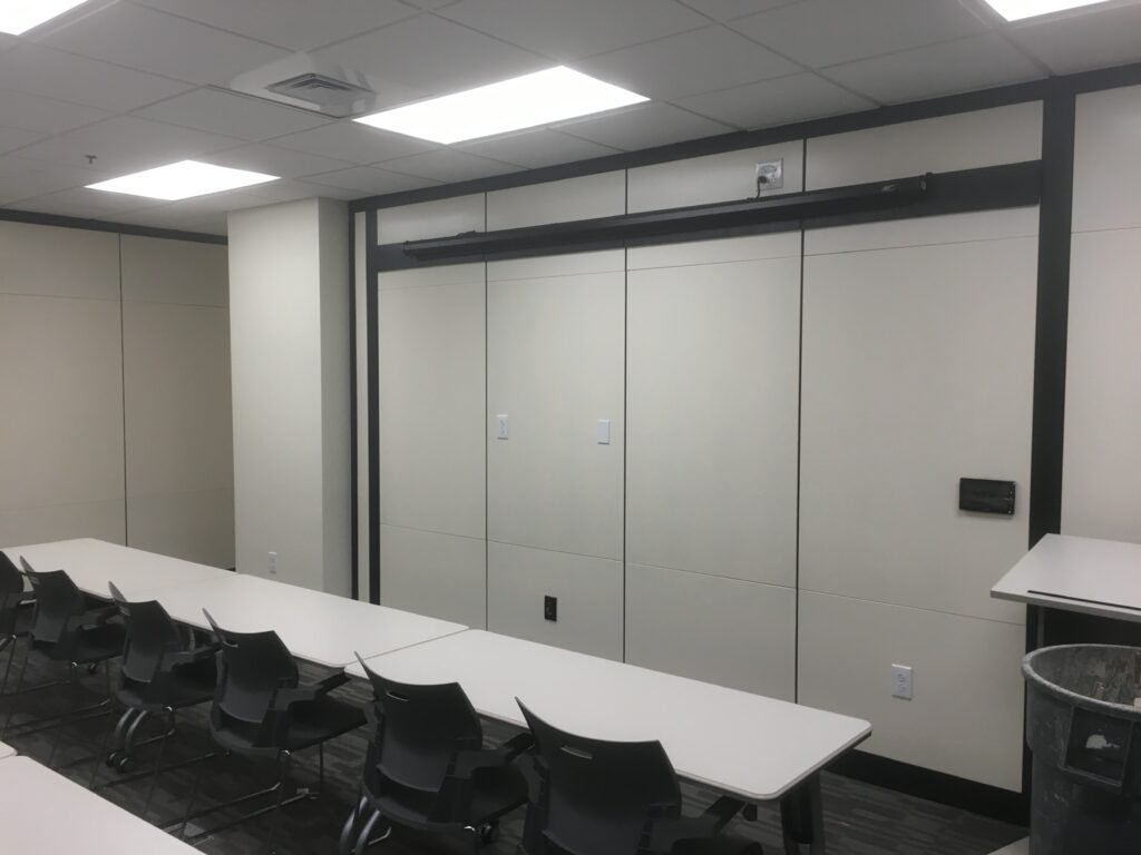 CVN Conference room with Extron controls and Epson projector installed by Crescent Digital