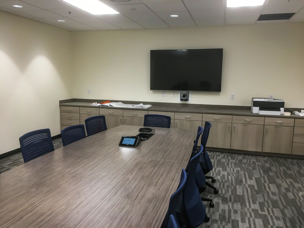 CVN Conference room Extron Controls, Logitech Rally Camera and LG digital display installed by Crescent Digital